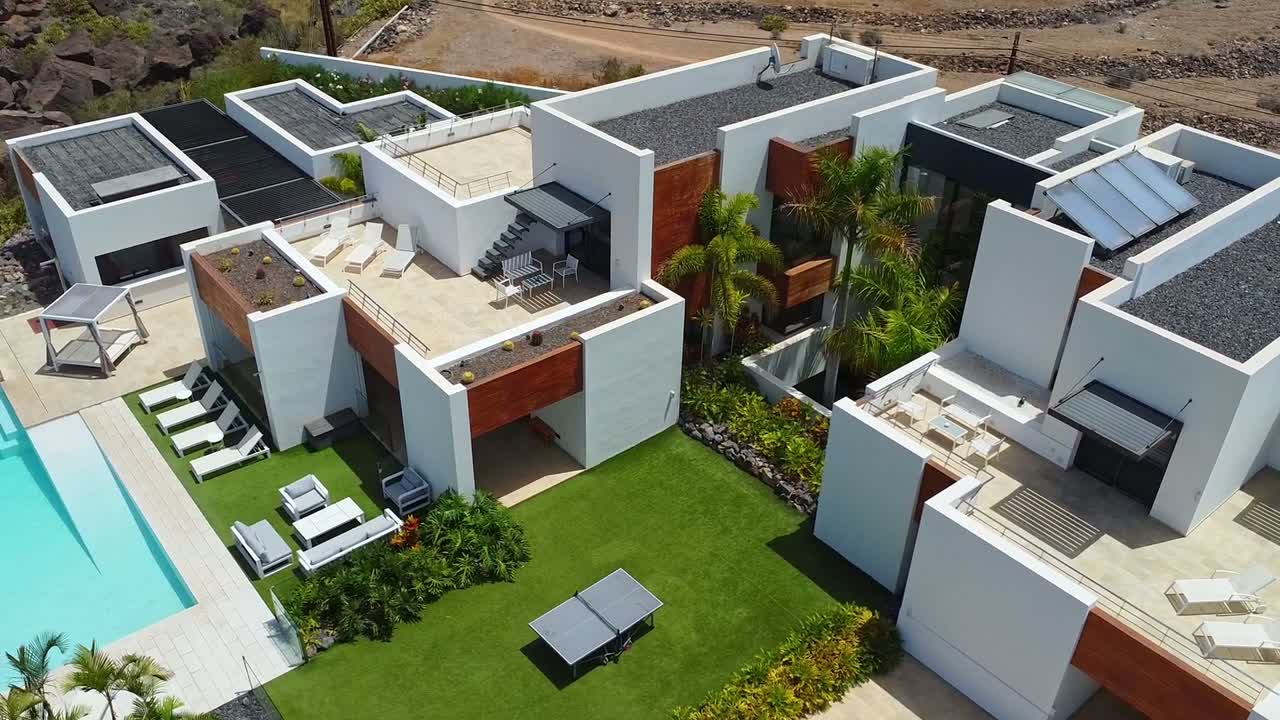 Aerial view of a Tenerife villa with a swimming pool and gardens